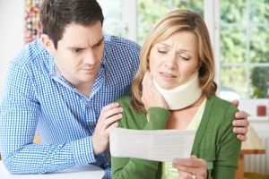 Injured woman with a neck brace